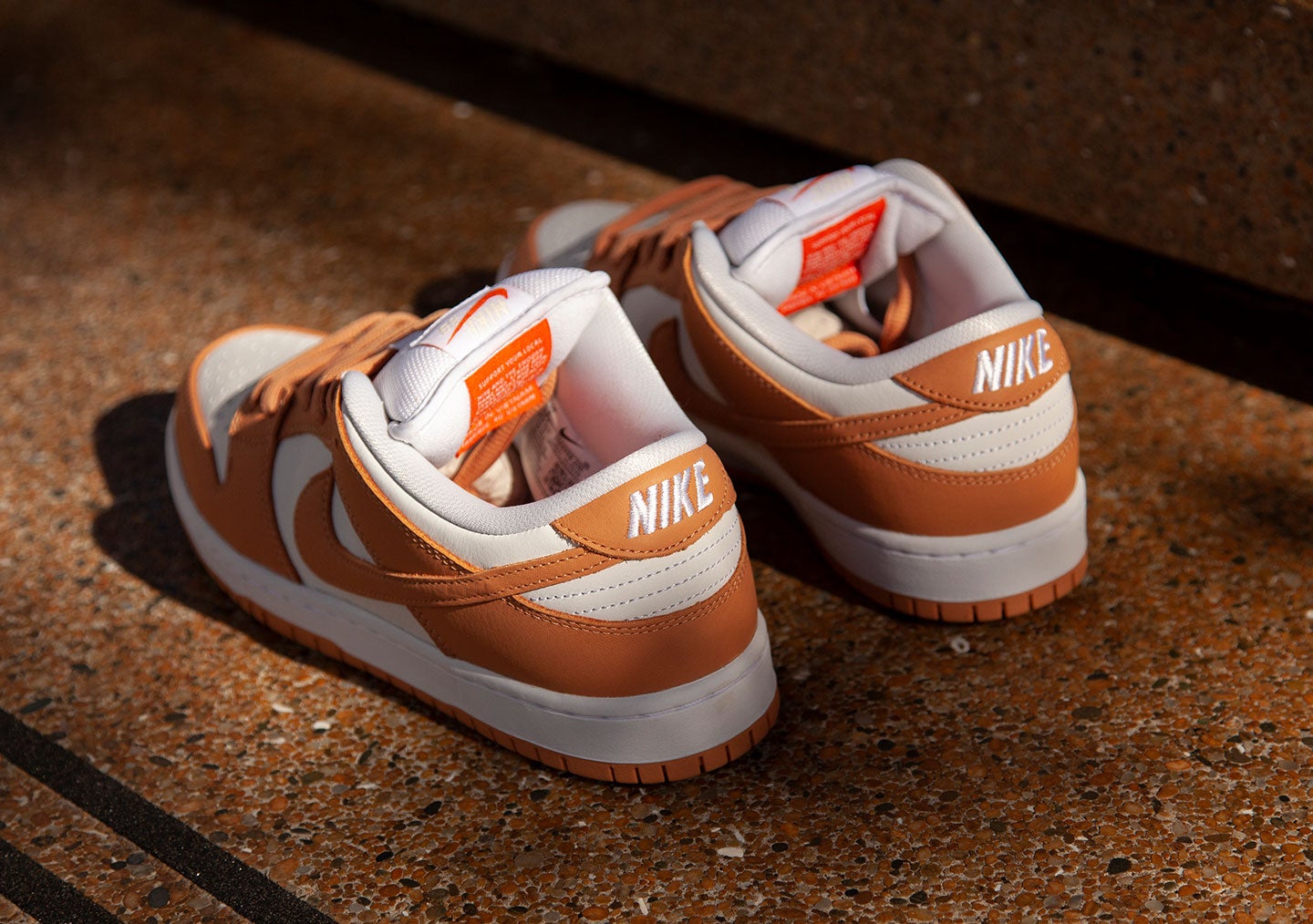 light cognac dunks on feet