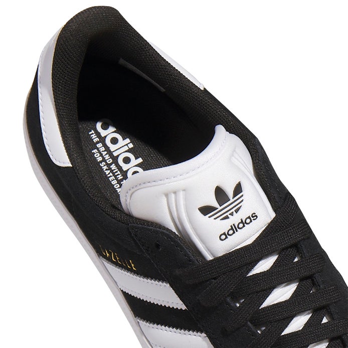 Adidas Gazelle ADV Shoe in Black/White/Gold | Boardertown