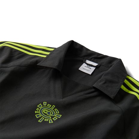 Adidas x Always Wind Jacket in Black/Solar Slime