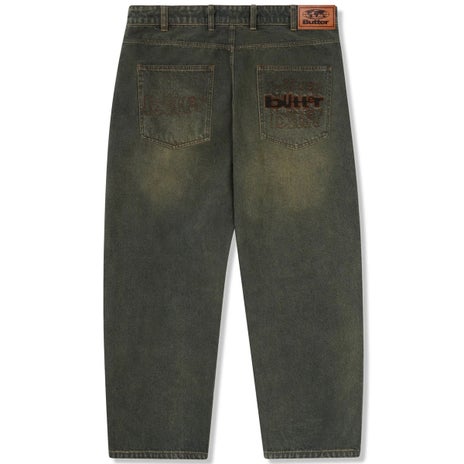 Butter Goods Warped Denim Jeans in Dirty Wash Indigo