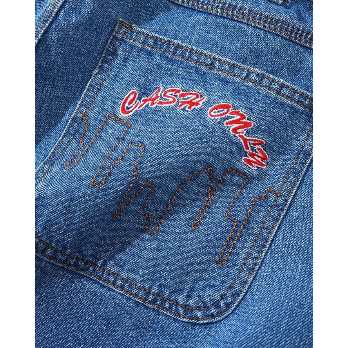 Cash Only Logo Baggy Denim Jeans in Washed Indigo | Boardertown